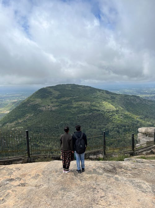 Free Couple Looking at a View of Landscape  Stock Photo