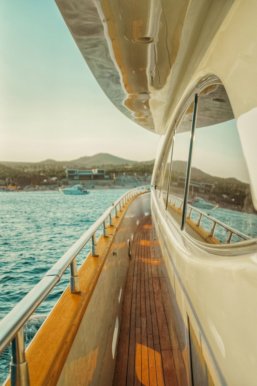 Yacht deck underway for private yacht charter basics route planning