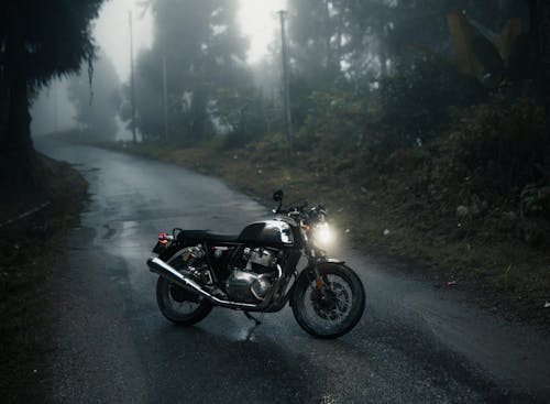 Royal Enfield Continental GT 650 Motorcycle on the Road on a Foggy Morning