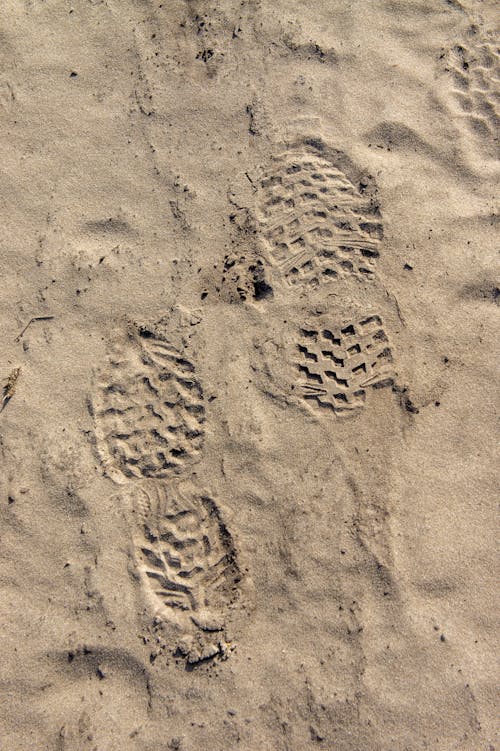 Gratis stockfoto met strandzand, voetafdruk, voetafdrukken