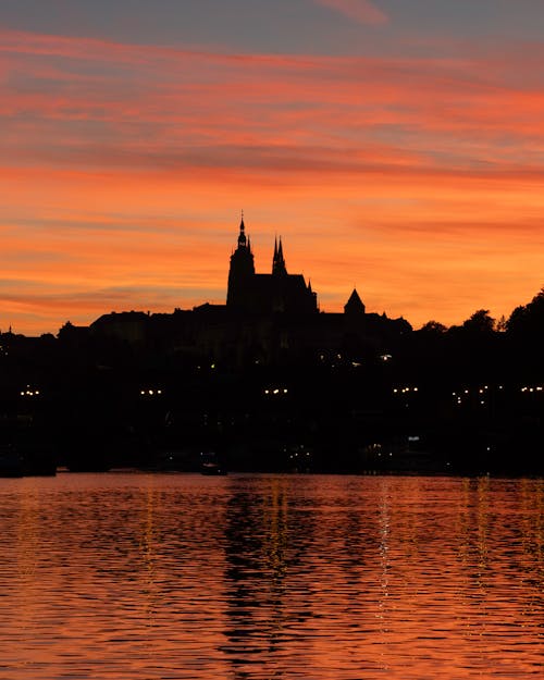 Silhouette of the Prague Castle seen from the Vltava River at Sunset
