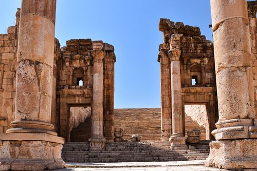 Free Explore the remarkable ancient ruins of Jerash, Jordan with grand stone columns and impressive architecture. Stock Photo