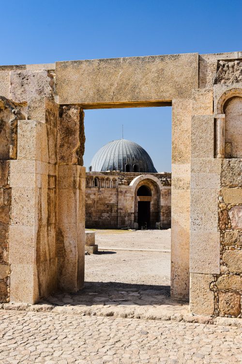 Free Ancient stone gateway leading to the Umayyad Palace in the Amman Citadel, Jordan. Stock Photo