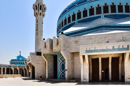 Free A view of King Abdullah I Mosque with its distinctive blue dome in Amman, Jordan. Stock Photo