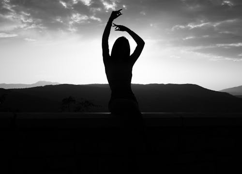 Silhouette of Posing Woman in Black and White