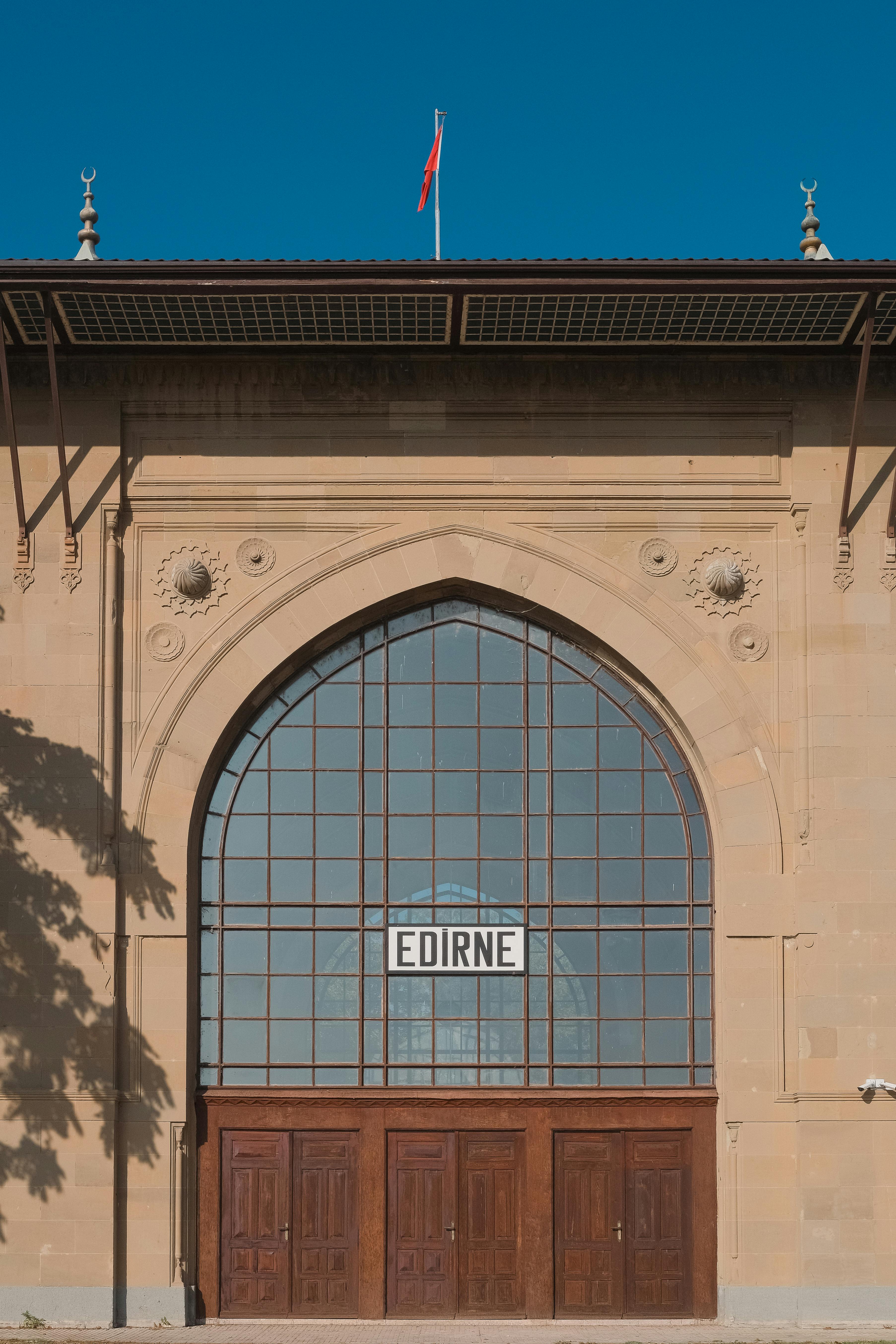 An architectural view of Edirne railway station's historic façade in Turkey.