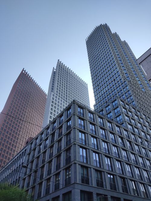 Free Low angle view of modern skyscrapers in downtown Den Haag, Netherlands' urban district. Stock Photo