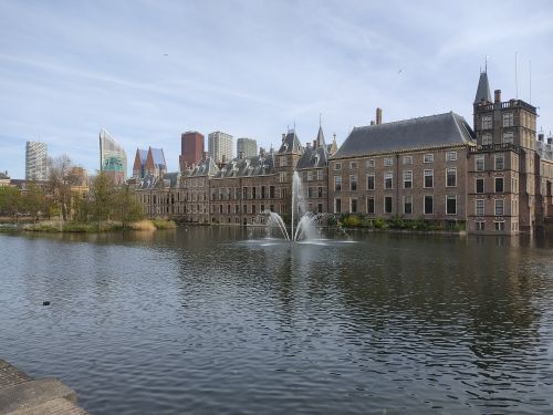 Free Scenic view of Binnenhof with historic architecture and fountain in The Hague, Netherlands. Stock Photo