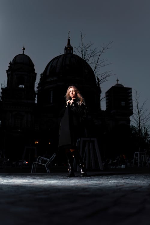 Model in Black Coat and Boots