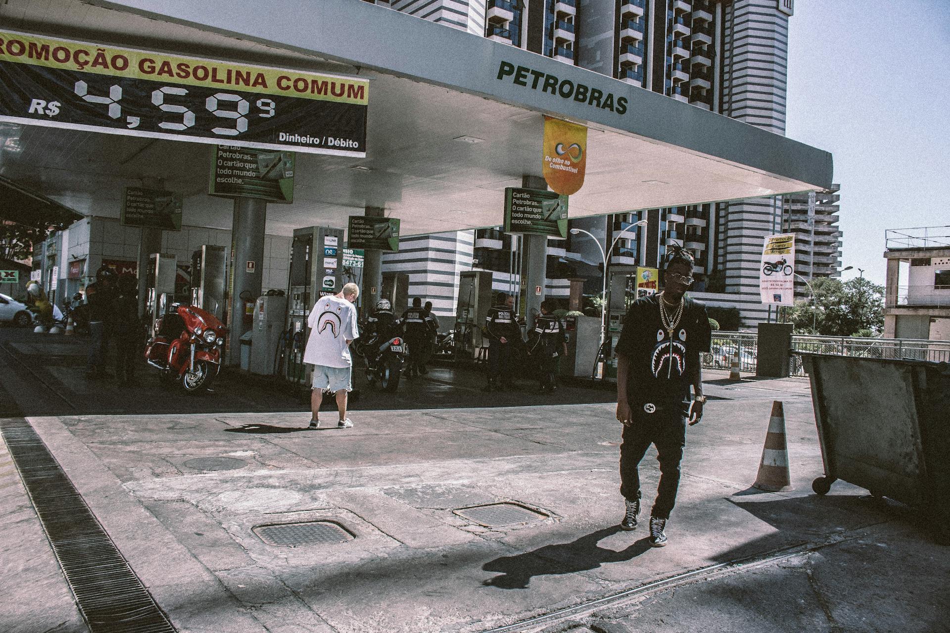 Man Walking Behind Petrobras Gasoline Station