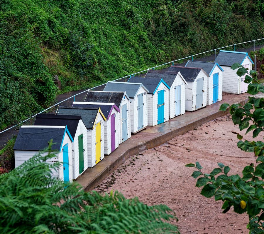 Colourful beach huts on the seafront near Paignton in Devon