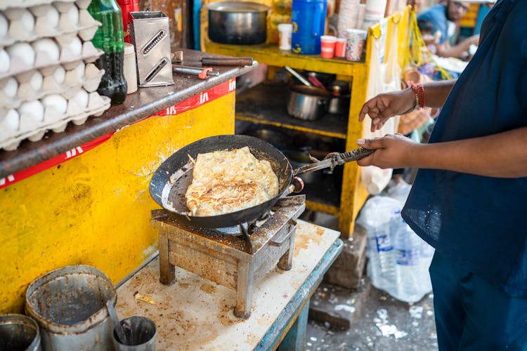 Man Hands Holding Pan And Cooking