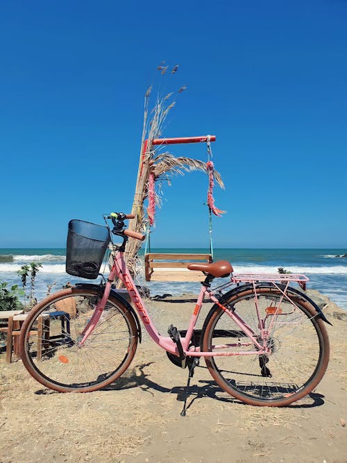 Pink Bicycle on Beach