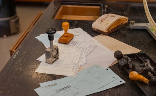 Desk with Documents and Stamps