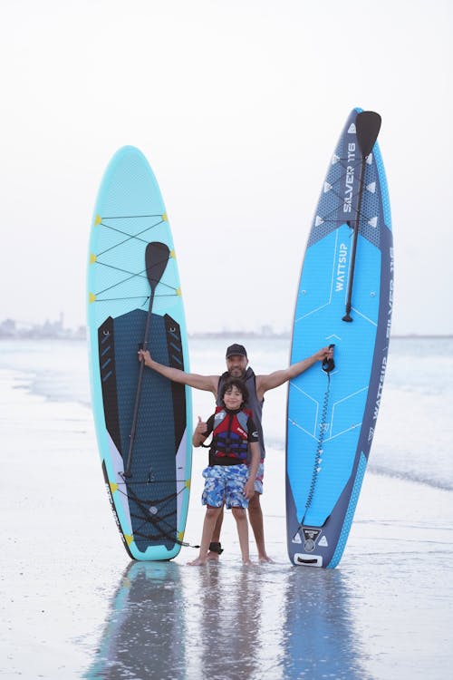 paddleboarding, 人, 垂直拍摄 的 免费素材图片