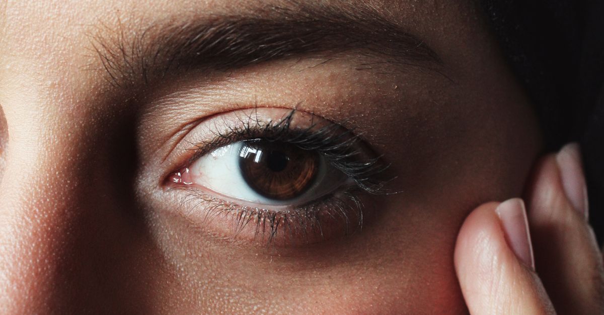Face Closeup of Woman with Hand on a Cheek · Free Stock Photo