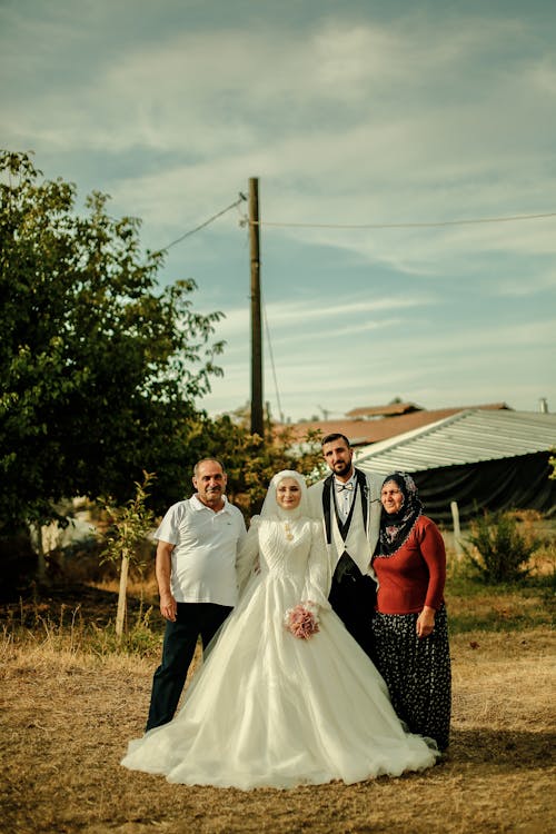 Newlyweds with Parents in Village