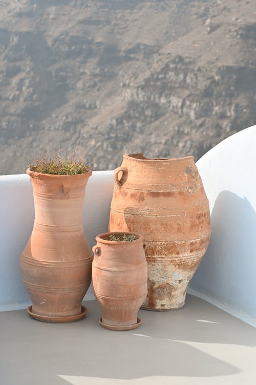 Earthenware Pots Standing on a Balcony