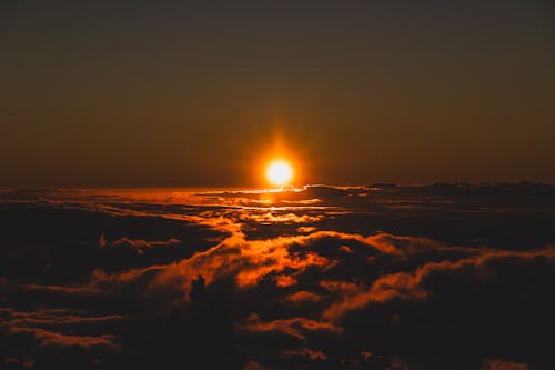 Sunset over Clouds in Sky
