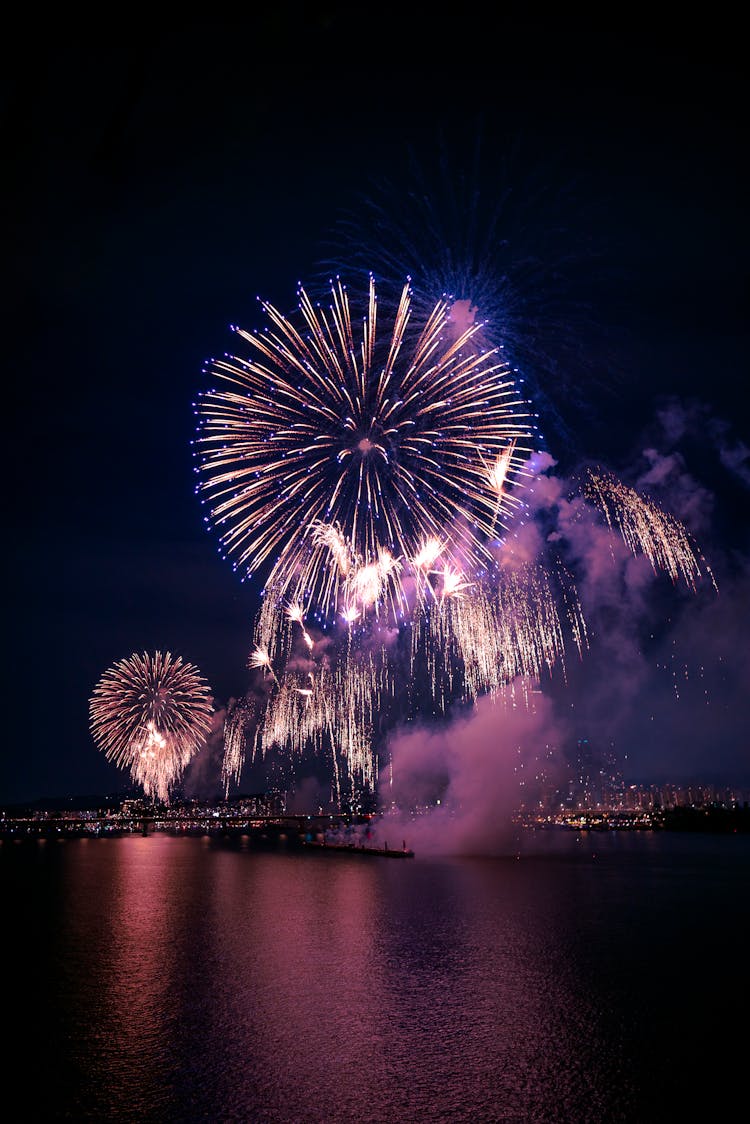 Fireworks Exploding Against A Night Sky