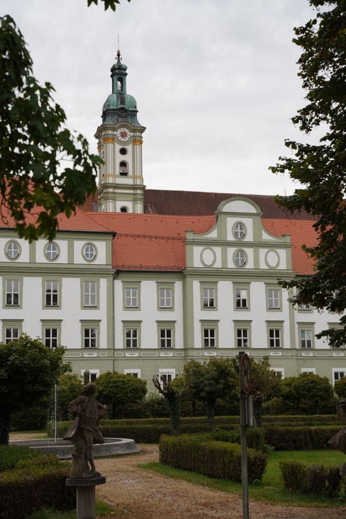 Free A picturesque Baroque monastery set amidst lush greenery in Fürstenfeldbruck, Bavaria. Stock Photo
