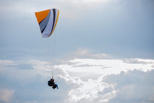 Couple Parachuting in Sky