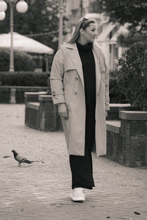 Woman in Trench Coat in Black and White