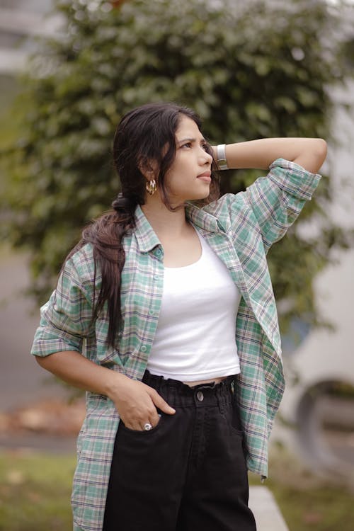 Model Posing in Checked Blouse