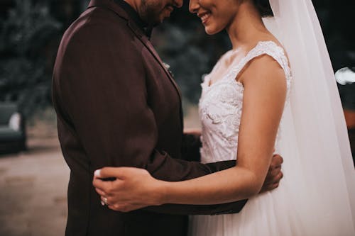 Free Couple Standing and Hugging Stock Photo