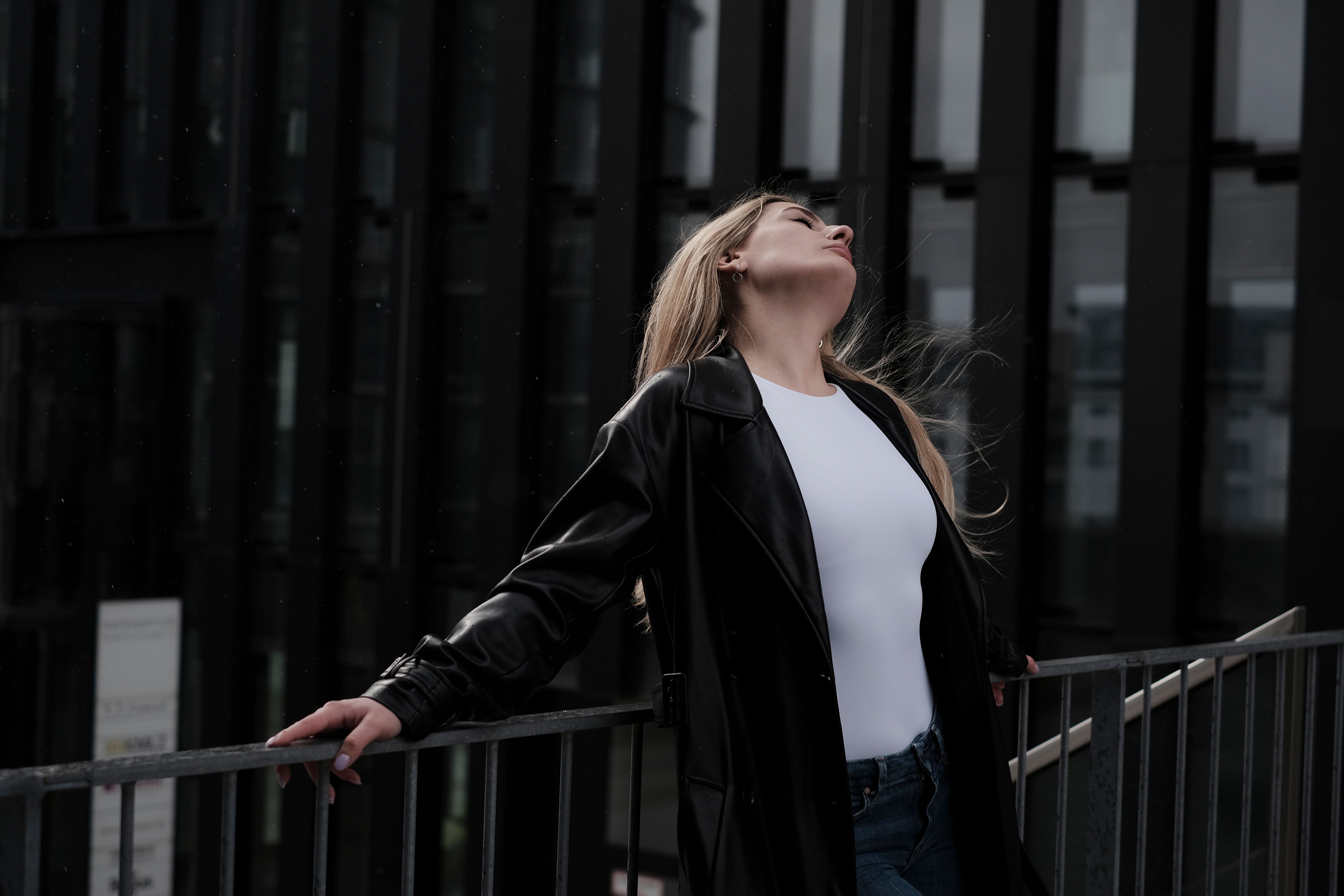 Blonde Model Leaning on Railing · Free Stock Photo