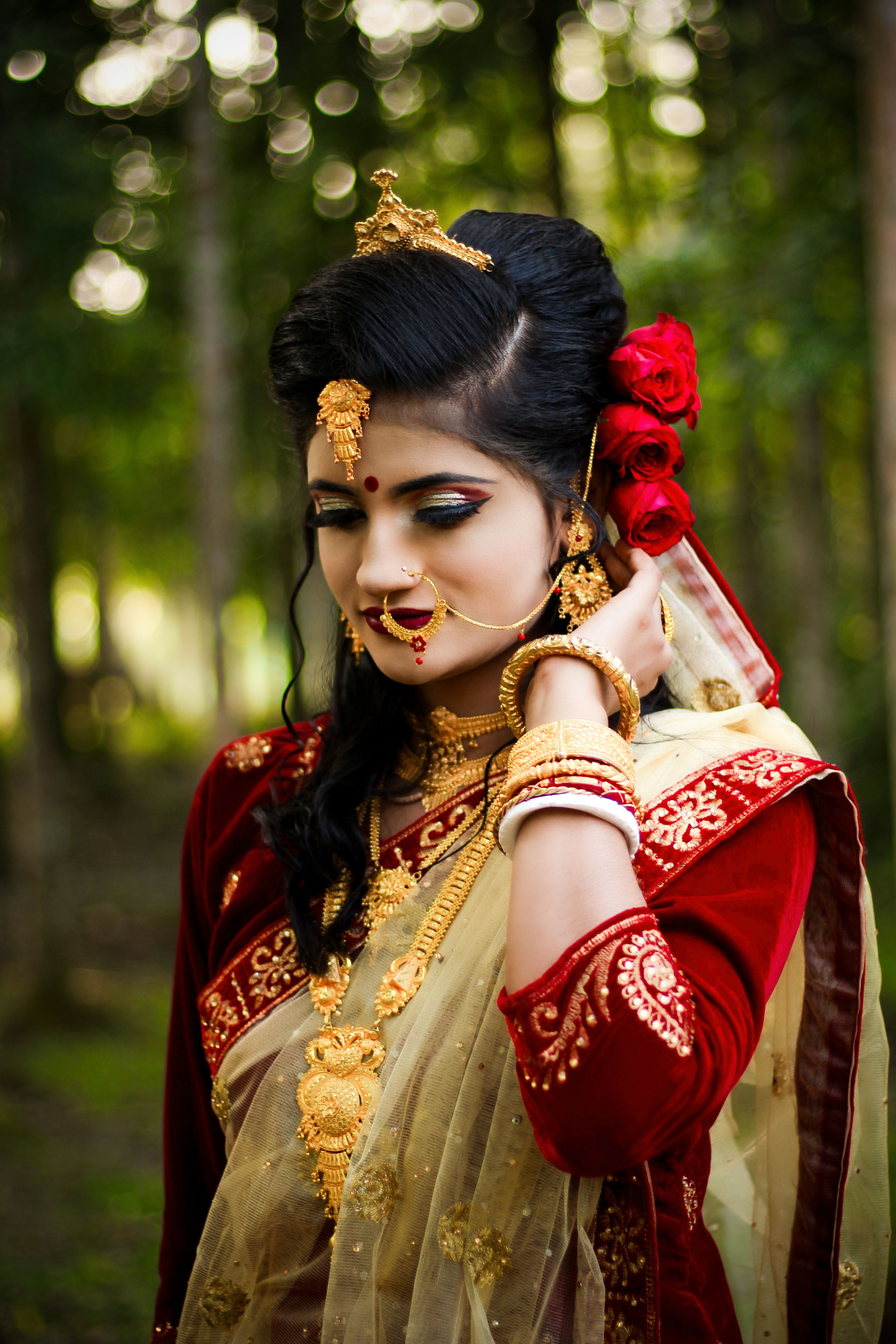 Portrait of Woman in Traditional Clothing and with Golden Jewelry ...