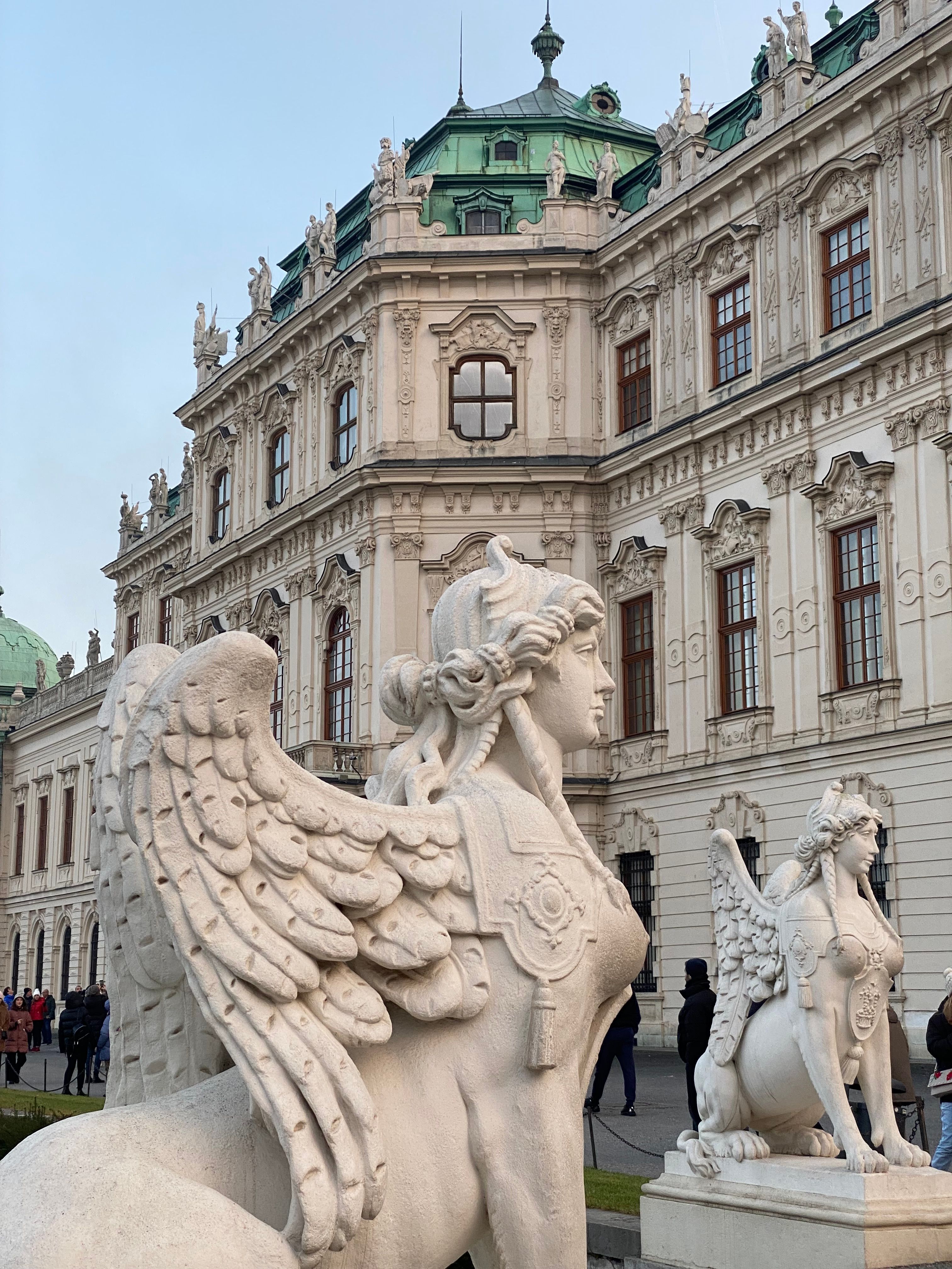 Free Exquisite baroque architecture of Vienna's Belvedere Palace with iconic sphinx sculptures. Stock Photo