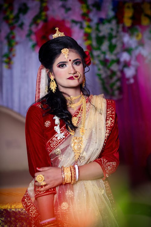 Woman with Golden Jewelry and with Traditional Clothing