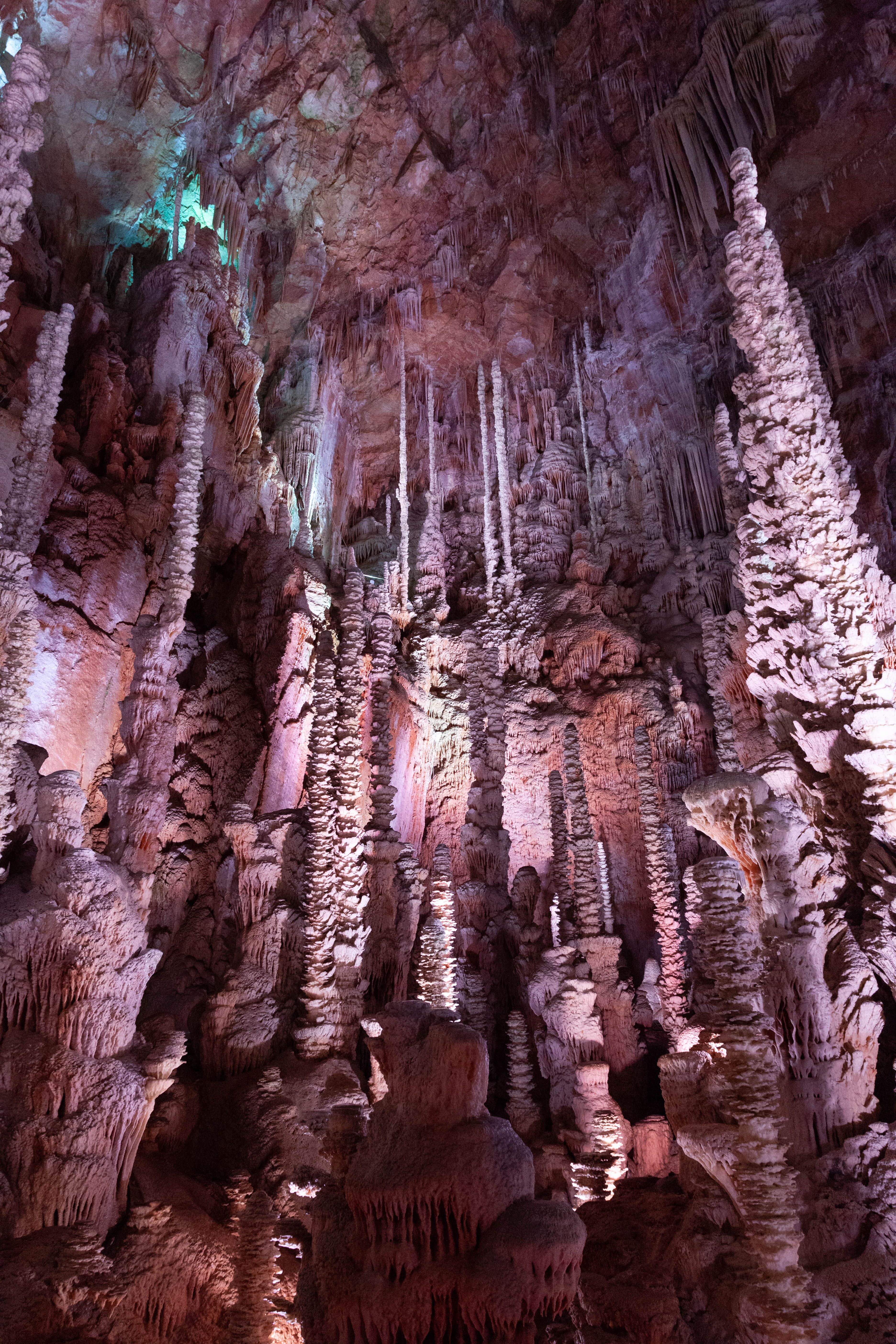 Explore the mesmerizing stalactite formations in Aven Armand Cave, France.