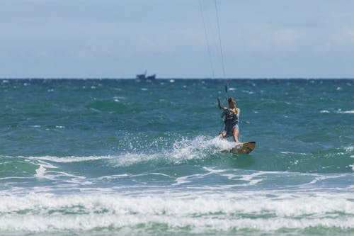 Kitesurfing Woman on Sea Coast