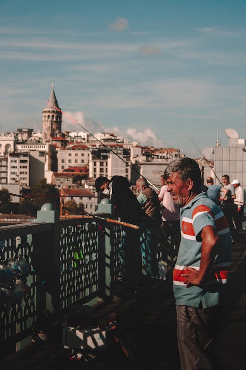 People Fishing on a Bridge in Istanbul 