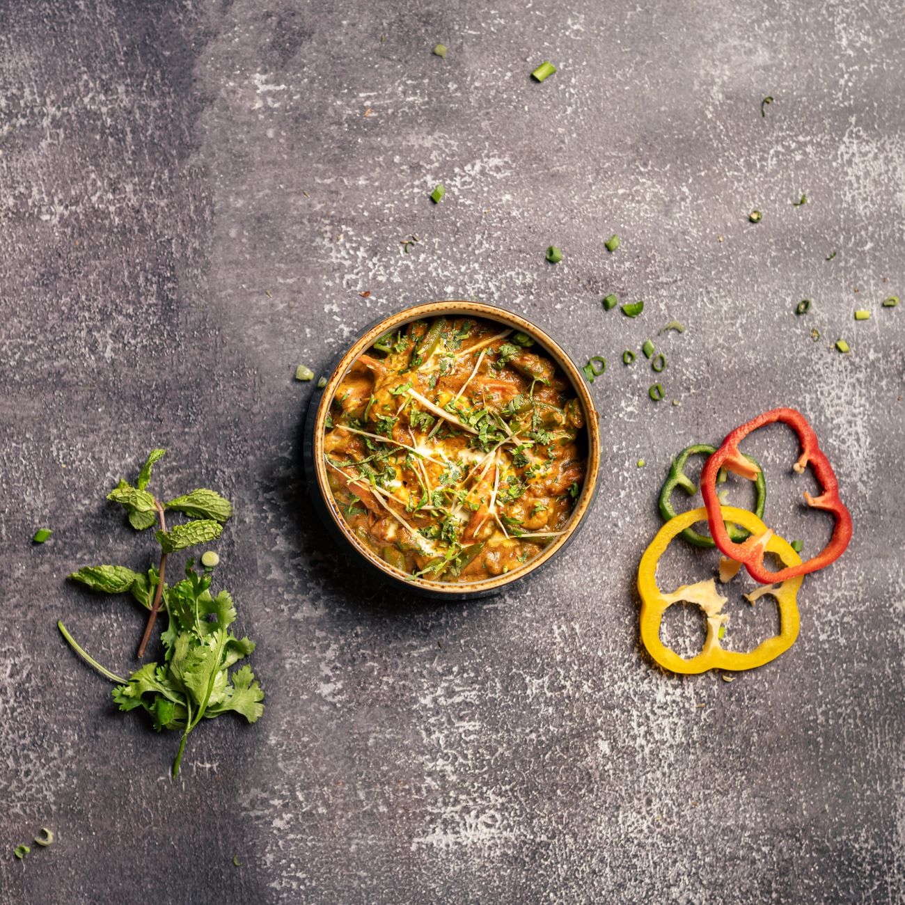 Photo by aboodi vesakaran on Pexels Steaming bowl of spicy curry on a restaurant table