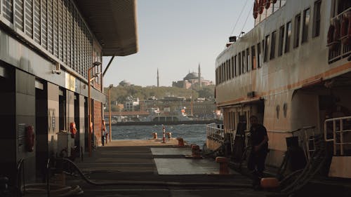 Man on Pier with Moored Ferry and Hagia Sophia behind