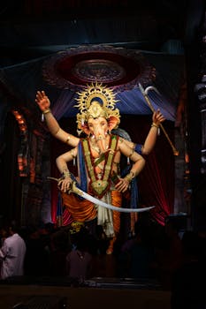Majestic Lord Ganesha statue during Ganesh Chaturthi festival in Mumbai, India.