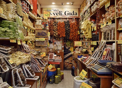 Free Merchandise Displayed in a Small Grocery Store Stock Photo