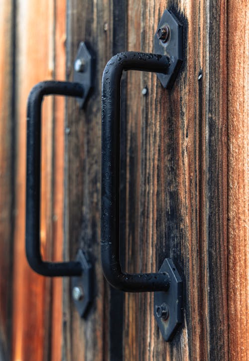 Close up of Handles on Wooden Door