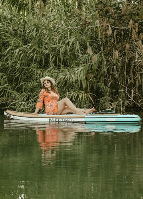 Photos gratuites de bateau, chapeau, être assis