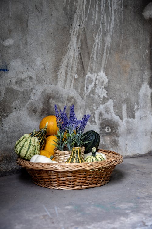 Pumpkins and Flowers in Basket