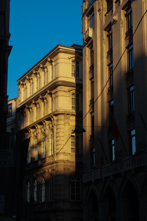Free Historic buildings on Bankalar Street in Istanbul bathed in warm evening light. Stock Photo