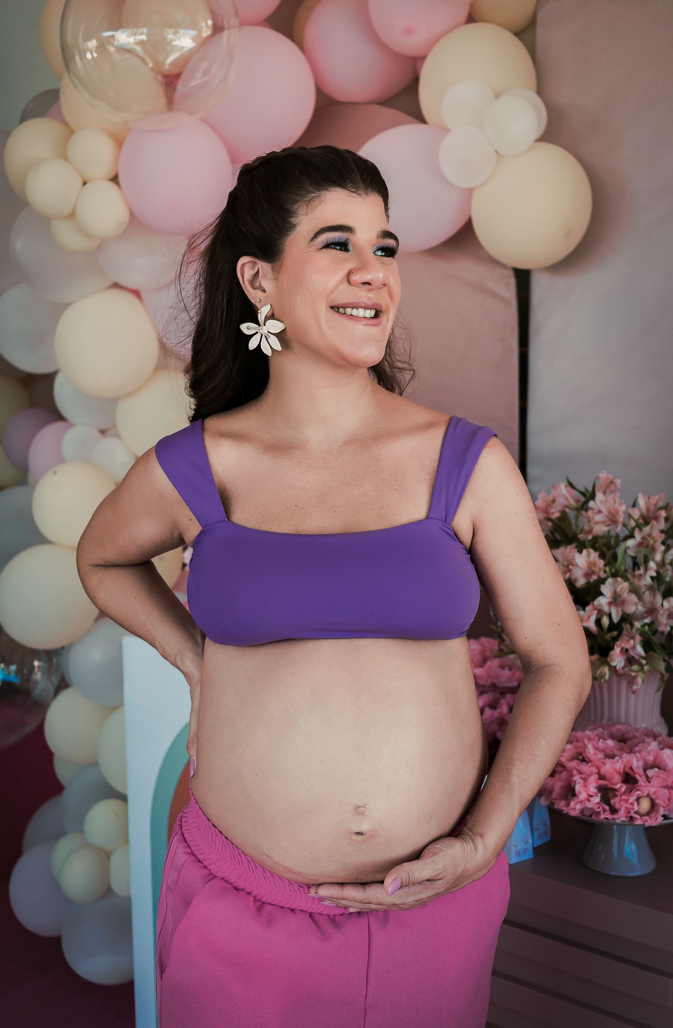 Festive baby shower celebration with pastel decorations and guests