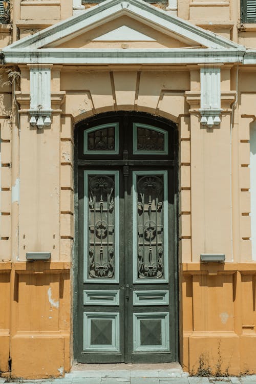 Traditional City Building with Wooden Entrance Door 