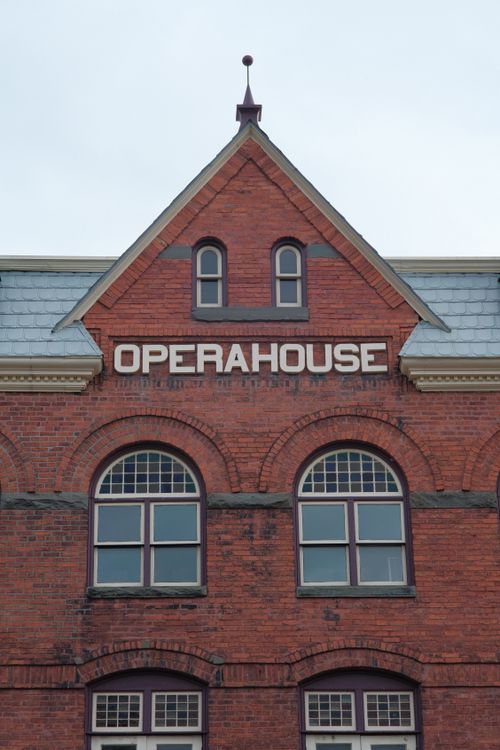 Opera Buildings Sign Opera House Text on Vintage Building Wall · Free Stock Photo