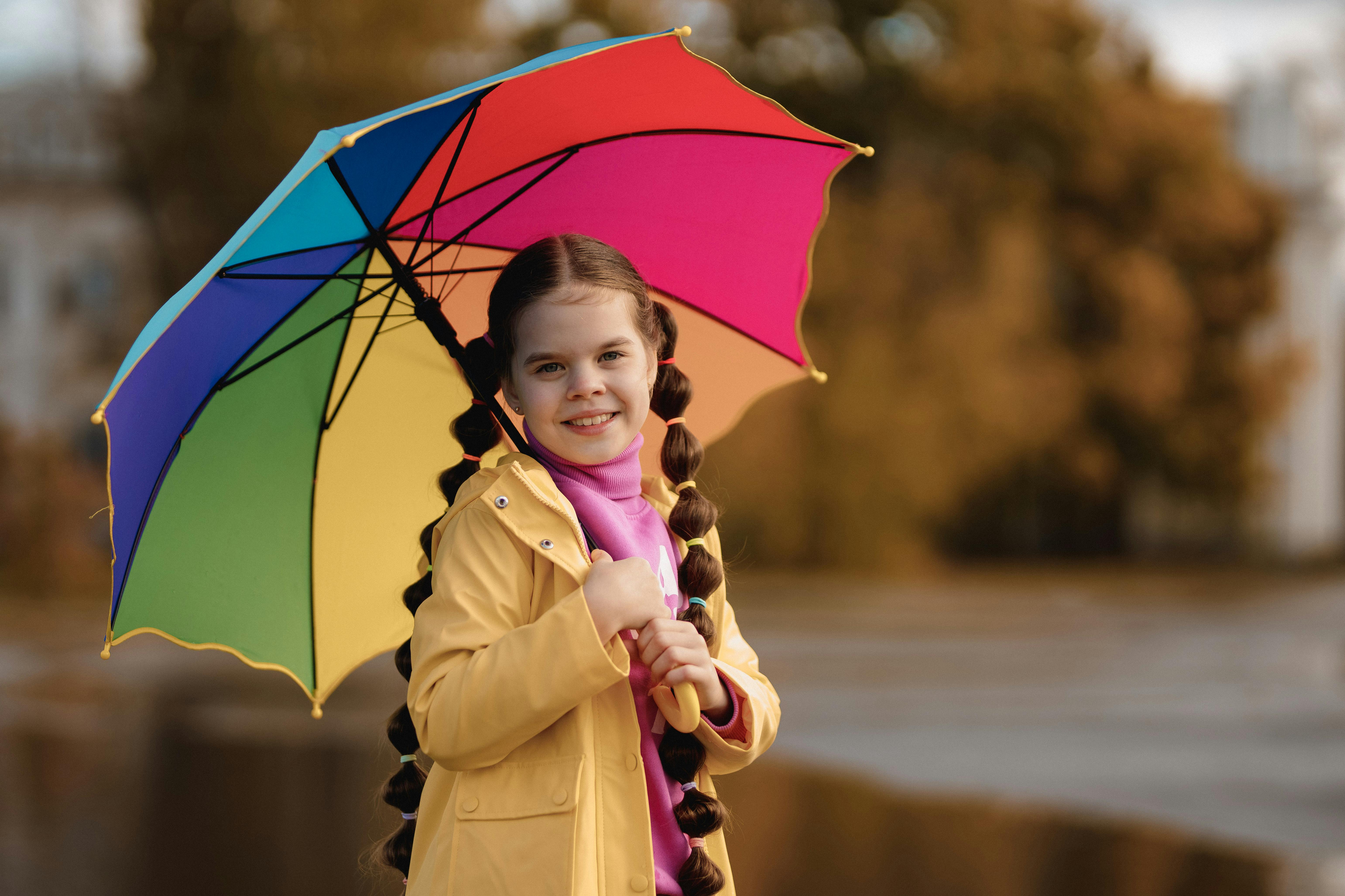 girl with a rainbow umbrella
