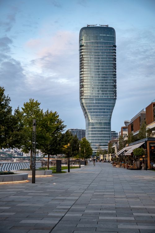 Free Captivating view of a modern skyscraper in Belgrade's urban landscape at dusk. Stock Photo
