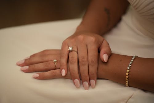 Manicure and Rings on Woman Hands
